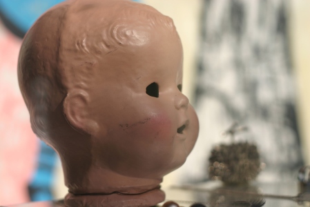 image of hollow toy baby head 
